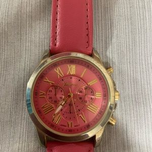 Pink Geneva watch with gold rim and leather band